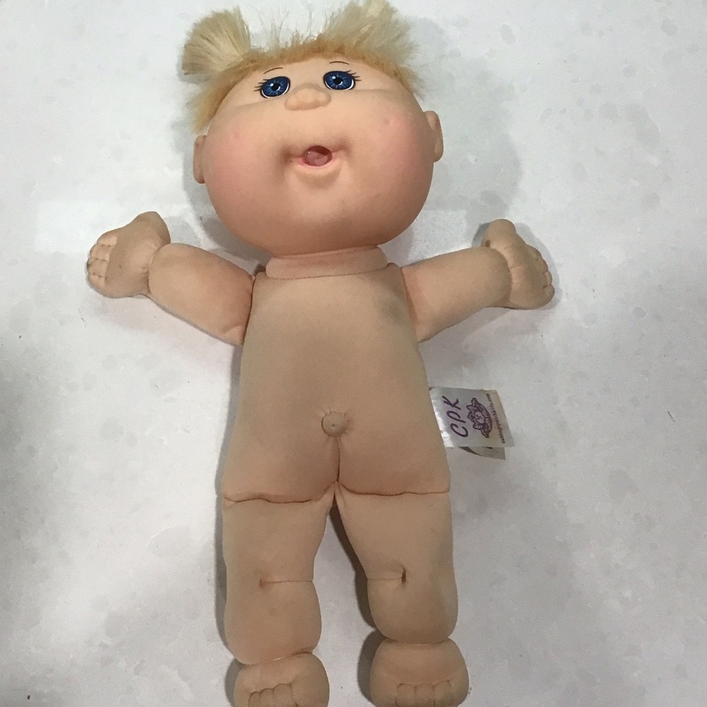 Adorable 2006 Cabbage Patch Kid with Blue Eyes and pig tails